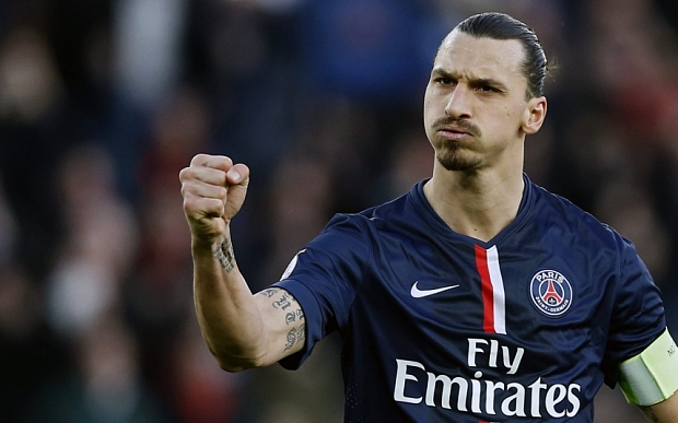 epa04652164 Paris Saint Germain player Zlatan Ibrahimovic celebrates scoring the second goal during the Ligue 1 match between Paris Saint Germain (PSG) and RC Lens at the Parc des Princes stadium, in Paris, France, 07 March 2015.  EPA/IAN LANGSDON