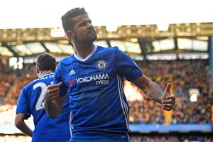 Chelsea's Brazilian-born Spanish striker Diego Costa celebrates after scoring the opening goal of the English Premier League football match between Chelsea and West Bromwich Albion at Stamford Bridge in London on December 11, 2016. / AFP / Justin TALLIS / RESTRICTED TO EDITORIAL USE. No use with unauthorized audio, video, data, fixture lists, club/league logos or 'live' services. Online in-match use limited to 75 images, no video emulation. No use in betting, games or single club/league/player publications.  /         (Photo credit should read JUSTIN TALLIS/AFP/Getty Images)