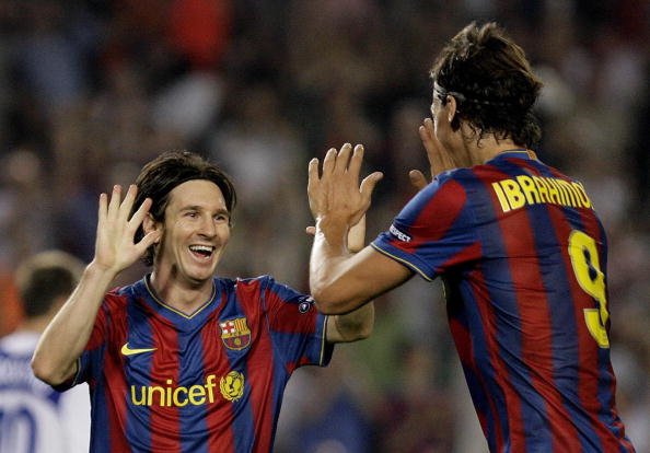 Barcelona's Argentinian forward Lionel Messi (L) is congratuled by his teammate Swedish forward Zlatan Ibrahimovic (R) after scoring during the UEFA Champions League football match between Barcelona and Dynamo Kiev at the Camp Nou stadium in Barcelona on September 29, 2009. AFP PHOTO/JOSEP LAGO (Photo credit should read JOSEP LAGO/AFP/Getty Images)