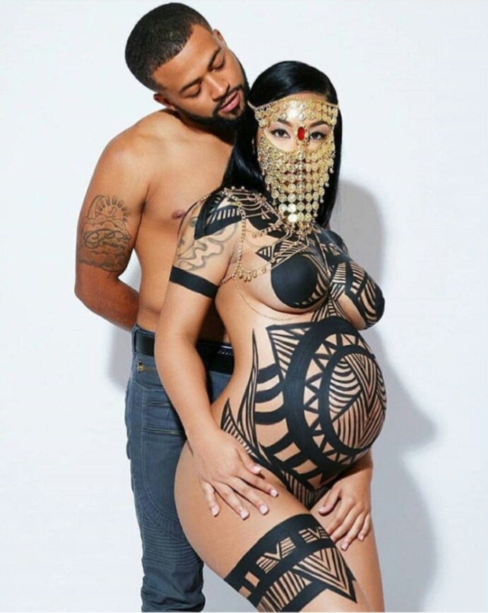 Pregnant Wife Goes Unclad In Painted Body, Rocking Face Mask In Maternity Shoot