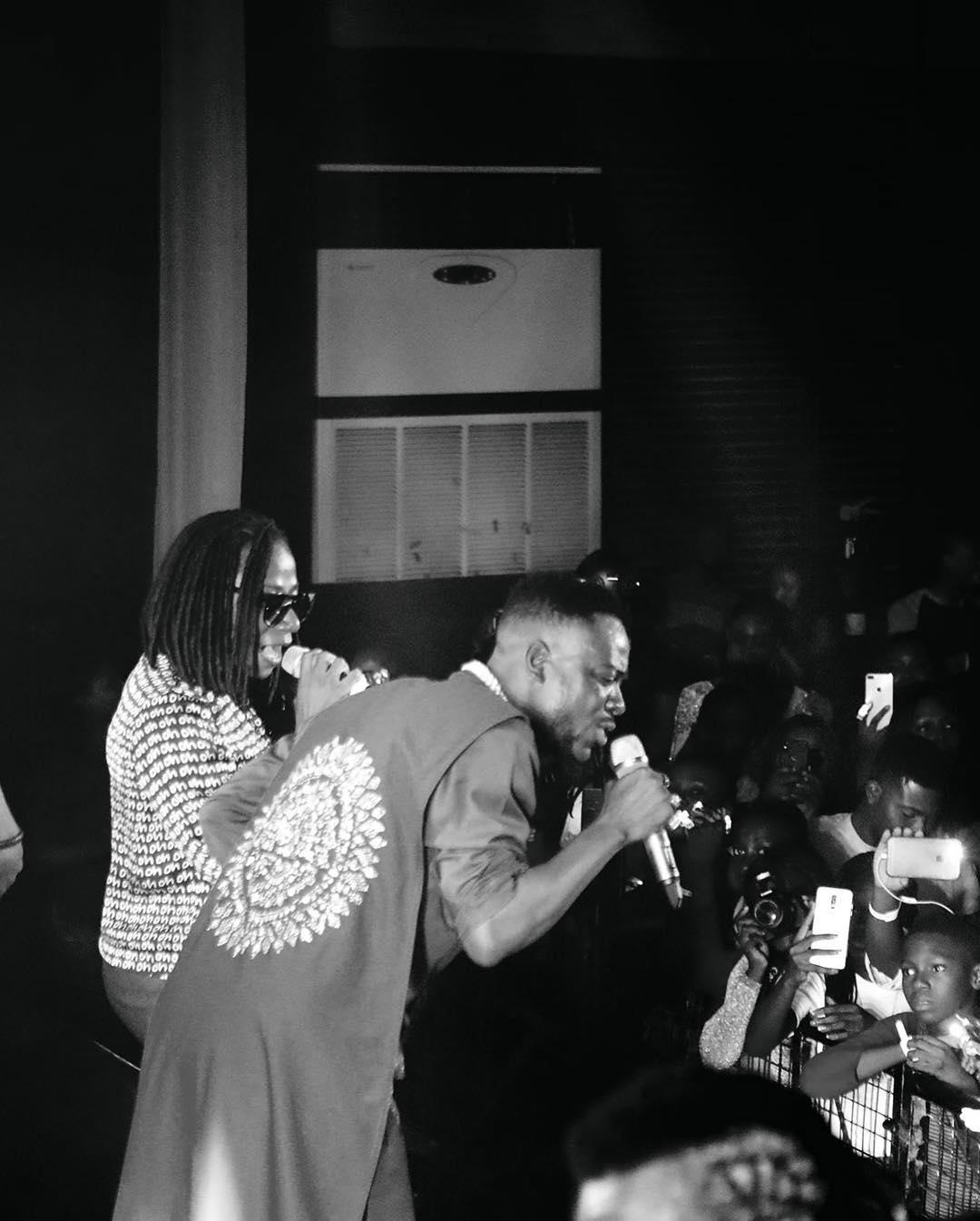 Adekunle Gold Kneels Down For Asa On Stage As They Perform Together